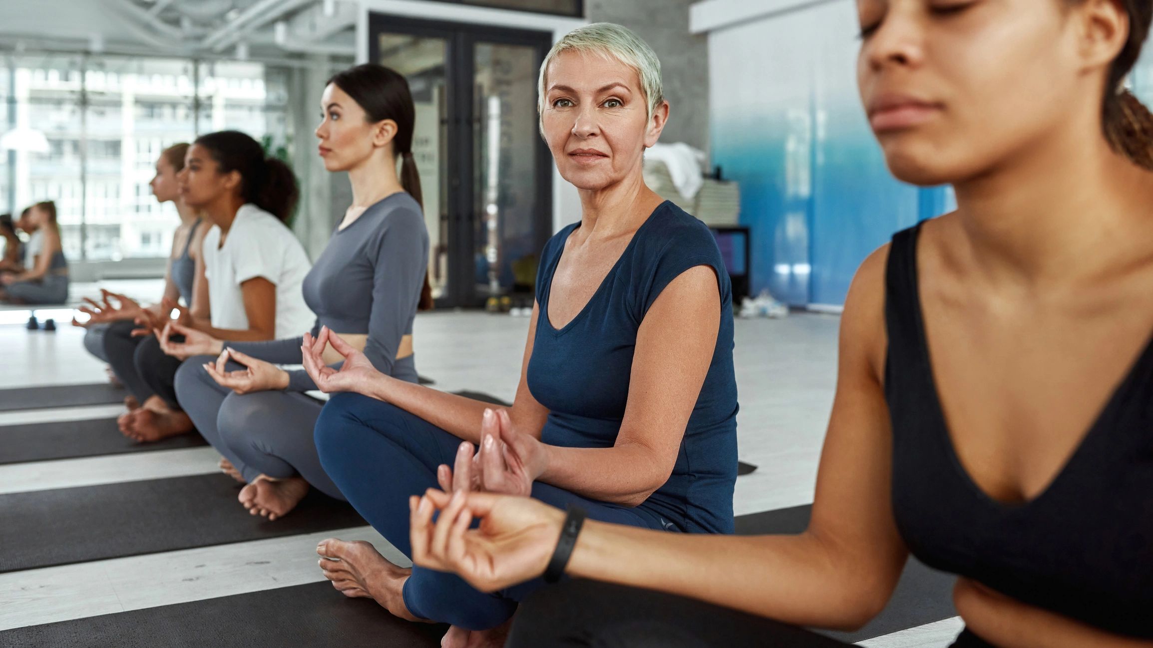 Wellness class participants training together