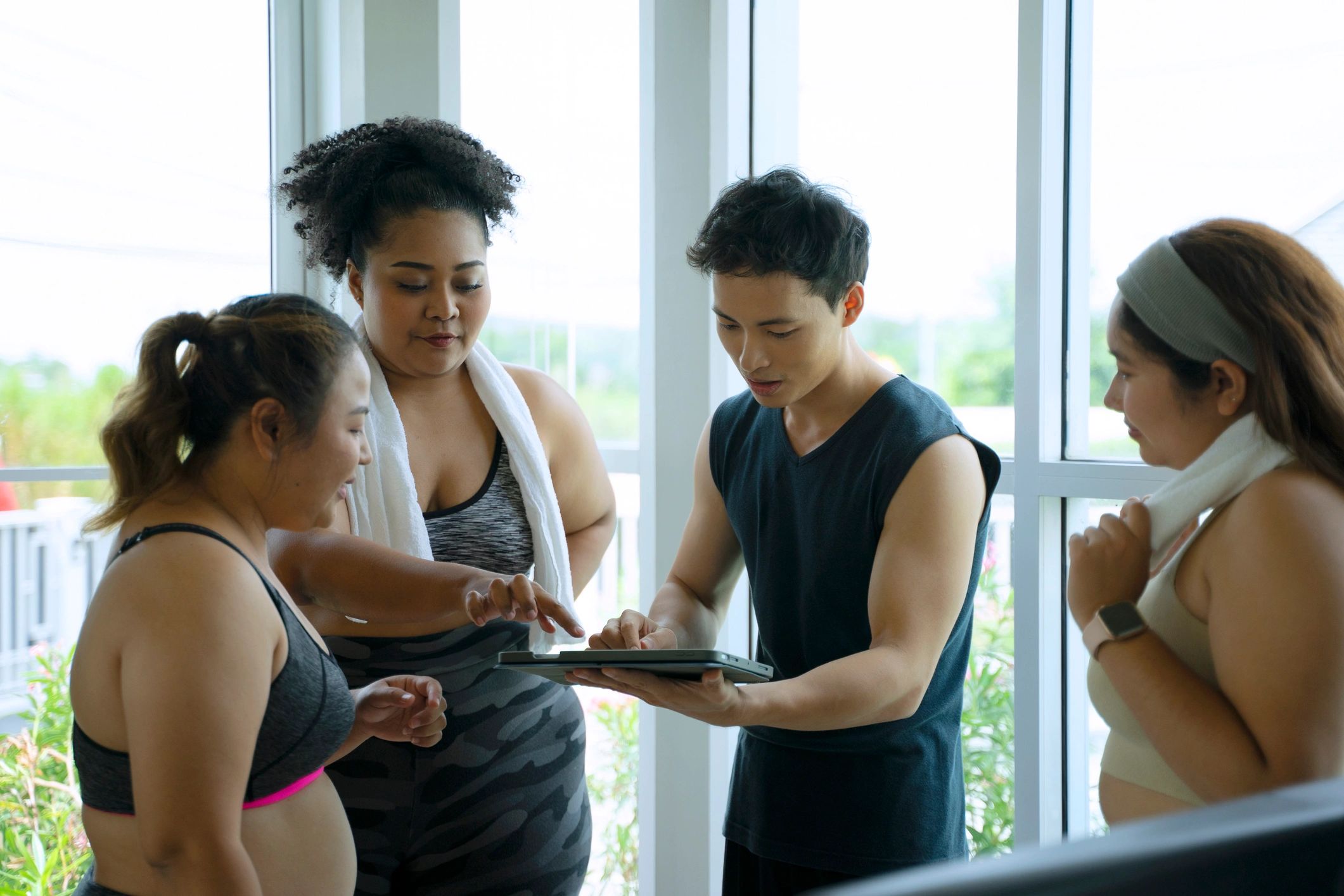 Women heading into the gym for training