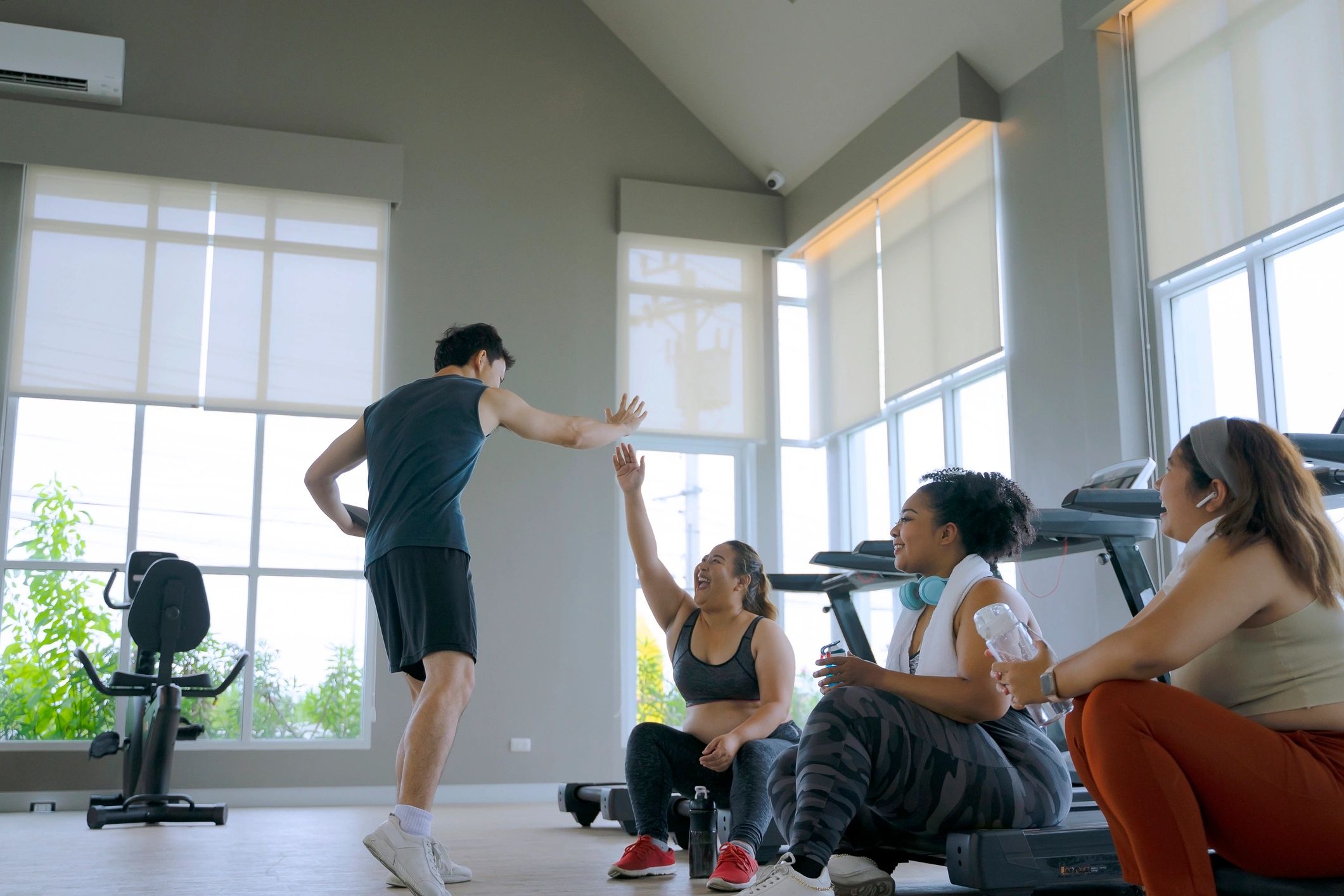 Supportive community fitness class participants