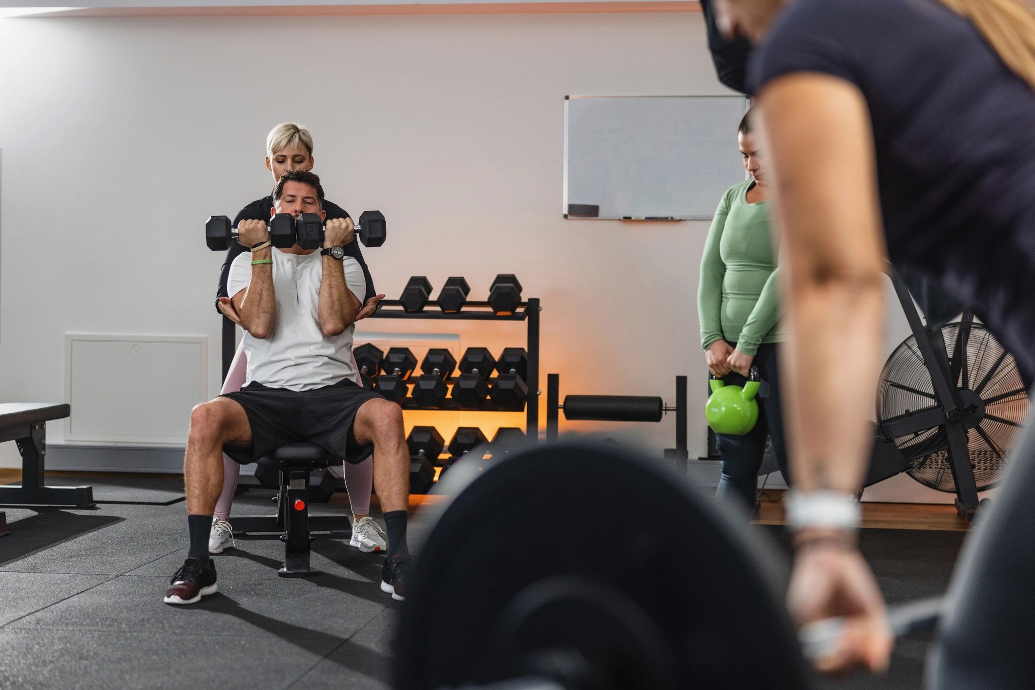 Fitness instructor guiding a gym session
